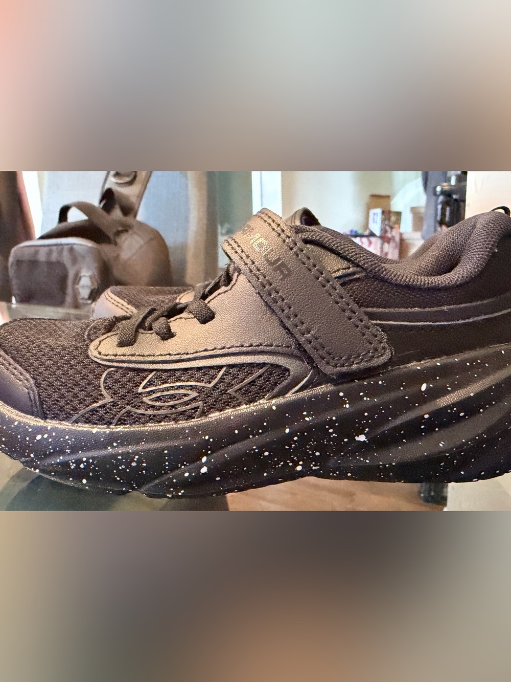 Under Armour Black Kids Sneaker with White Speckled Sole